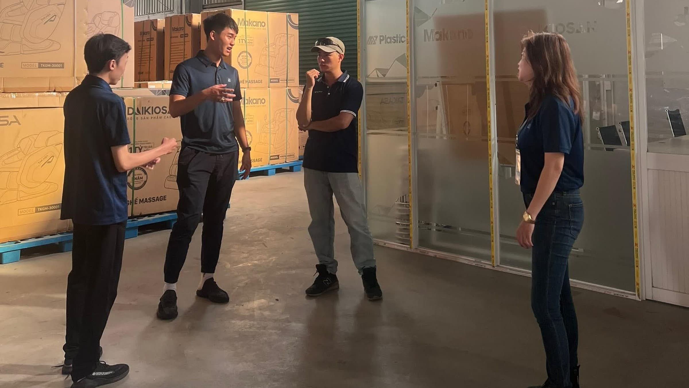Staffing agency team and client discussing worker requirements at an industrial worksite