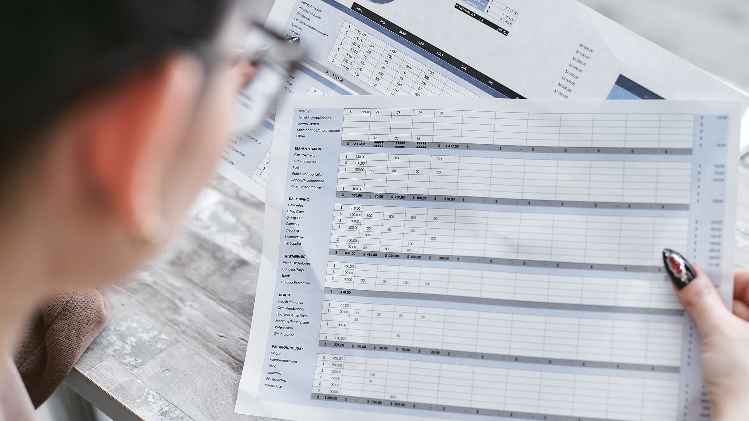 Staffing agency operator reviewing payroll and invoice calculations