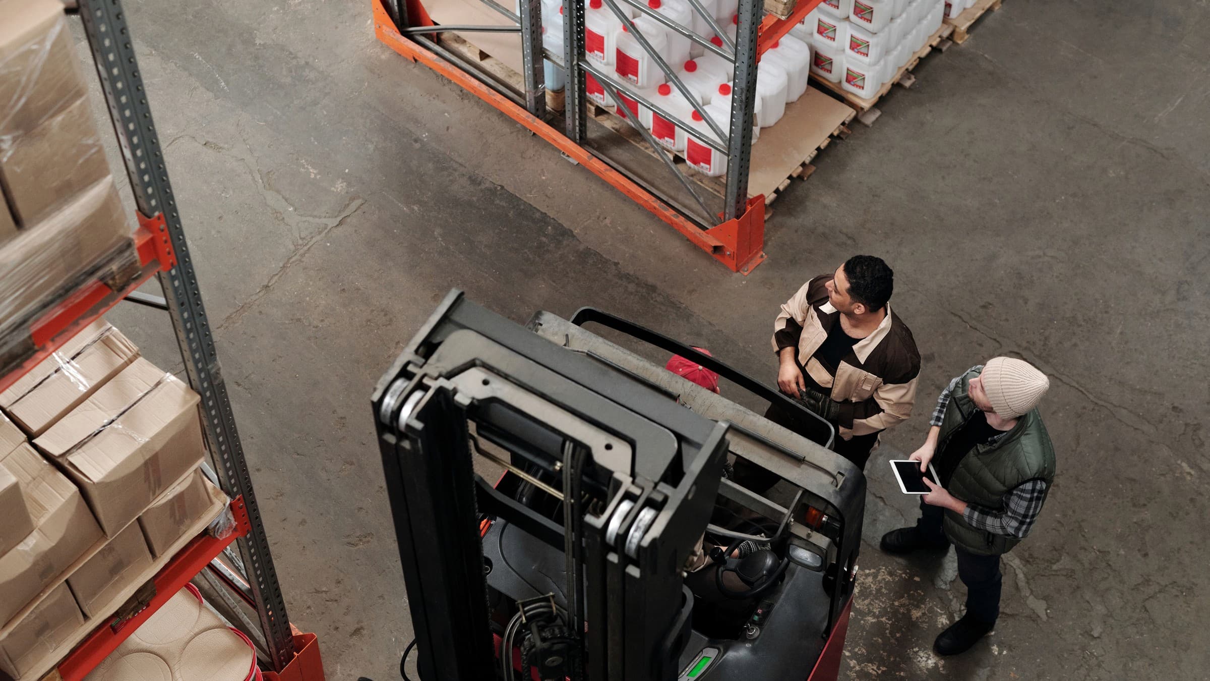 Wholesale team inspecting an inbound pallet after repeat demand is proven